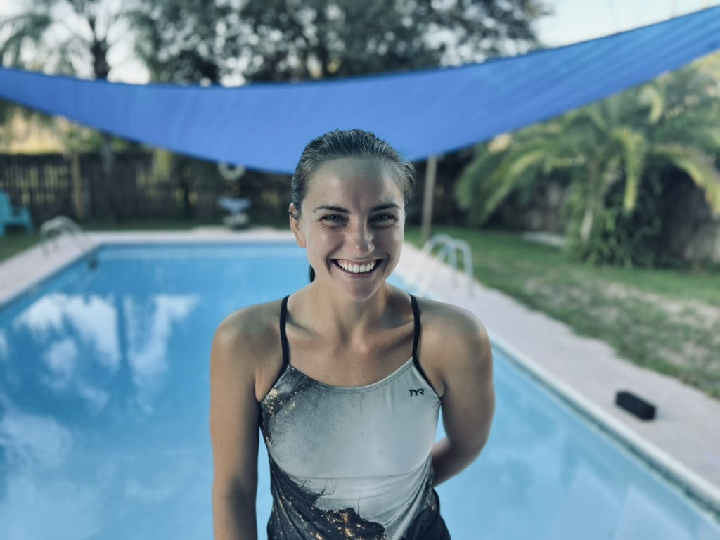 Coach Meredith poolside